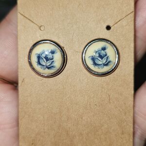 Silver toned blue enamel roses